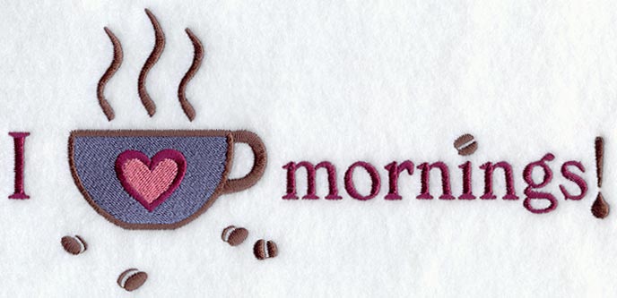 Embroidered mug design with I, a steamy red heart, Mornings text, and scattered brown coffee beans.