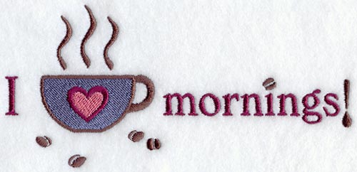 Embroidered design of a steaming mug shaped like a heart with scattered coffee beans below, for digital machine embroidery.