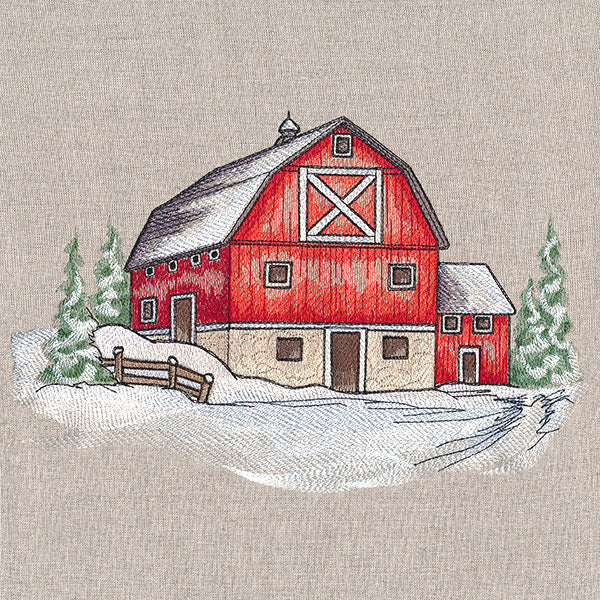 Red barn winter embroidery design with snowy trees, a wooden fence, and textured applique details on fabric.