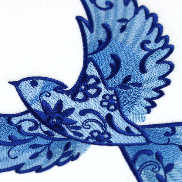 Flourishing Blue Jay in Flight