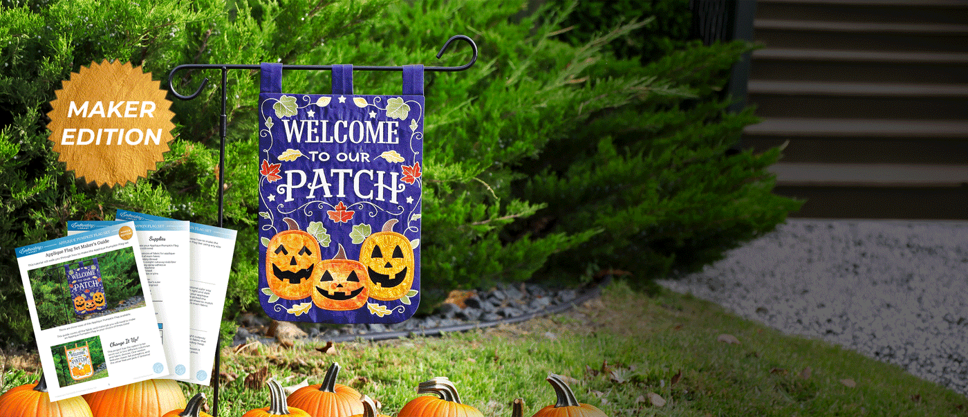 Maker Edition embroidered garden flag featuring “Welcome to Our Patch” lettering, colorful fall leaves, and three appliqué jack-o’-lanterns, displayed outdoors with pumpkins and Maker’s Guide instructions.