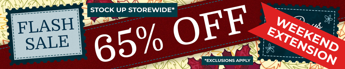 Banner with a red textured background featuring stitched cream fabric with holly embroidery and text blocks reading "FLASH SALE," "65% OFF," "STOCK UP STOREWIDE," "WEEKEND EXTENSION," and "*EXCLUSIONS APPLY.