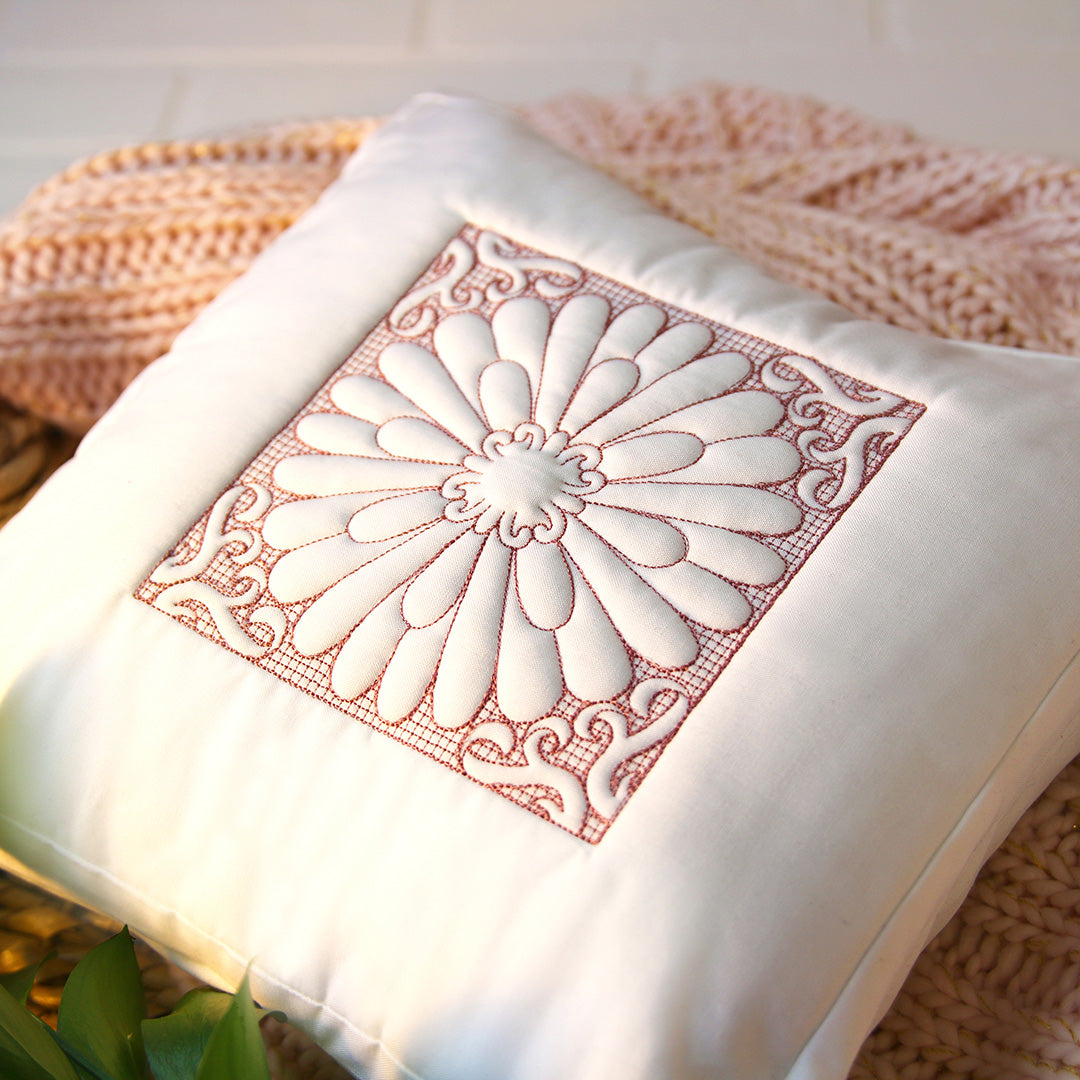trapunto machine embroidery on a pillow