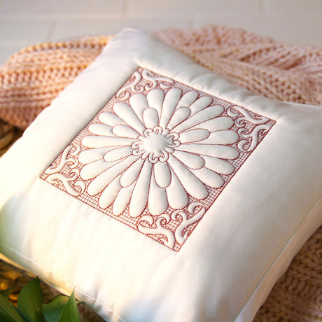 trapunto machine embroidery on a pillow