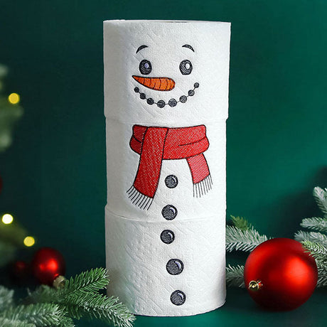 a Christmas snowman toilet paper stack created with machine embroidery designs