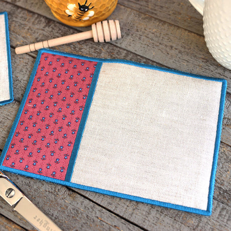 machine embroidery designs of a blank mug rug