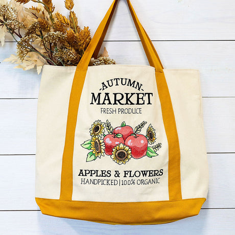 a classic tote bag with a fall embroidery design stitched on it