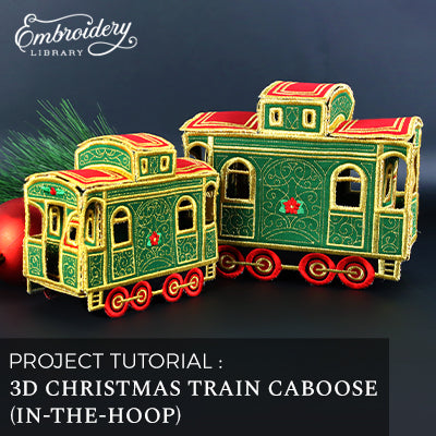 completed 3D Christmas Train caboose created with machine embroidery