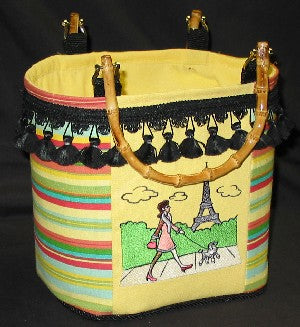 Completed Purse project, featuring Parisian Woman and Poodle design