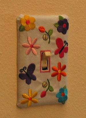 Completed embroidered Bold Flower Switchplate project