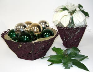 Completed Freestanding Lace Bowl project with ornaments, featuring Poinsettia Hexagon and Poinsettia Side designs
