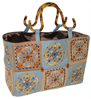 Completed Patchwork Handbag project, featuring Turkish Fancy Geometric Circle and Fans and Flourishes Geometric Square designs