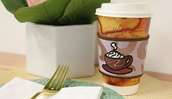 Completed embroidered Coffee Cup Sleeve project