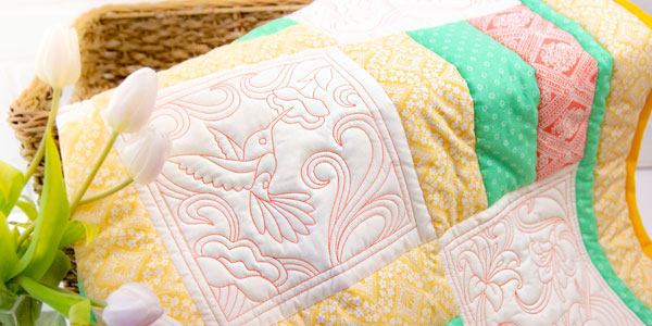 Quilting with Embroidery Designs