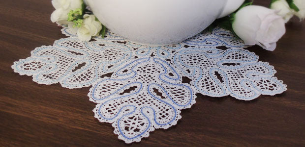 Completed Snowflake Doily (Battenburg Lace) project in white