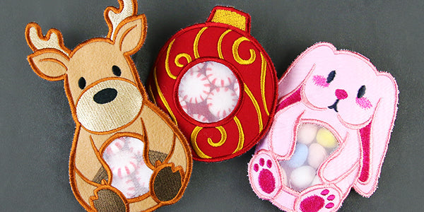 A reindeer, an ornament and a bunny candy holder