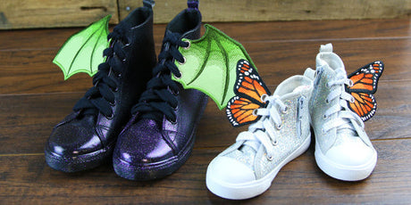 Shoes sporting completed embroidered wings in dragon and butterfly designs