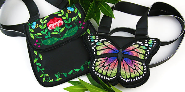 Completed Front Flap Purse project, featuring Folk Flowers and butterfly designs
