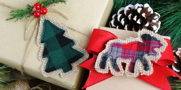 Completed Rustic Christmas Ornament project pictured with Christmas presents and holly