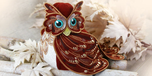 Completed Owl Stuffie 3D project with leaves in the background