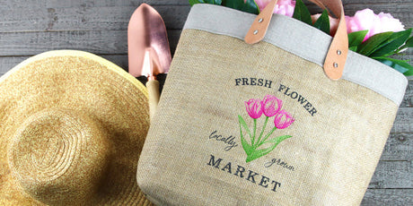market tote with leather straps featuring a machine embroidery design of flowers
