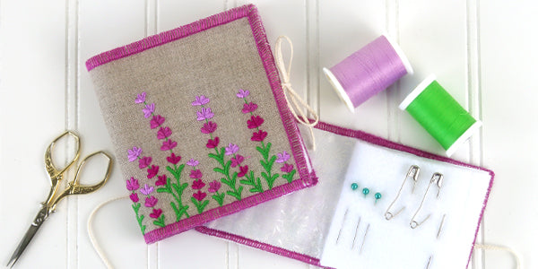 Completed needle book with embroidered flower design