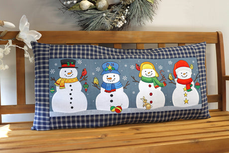 snowman bench pillow made with applique machine embroidery designs