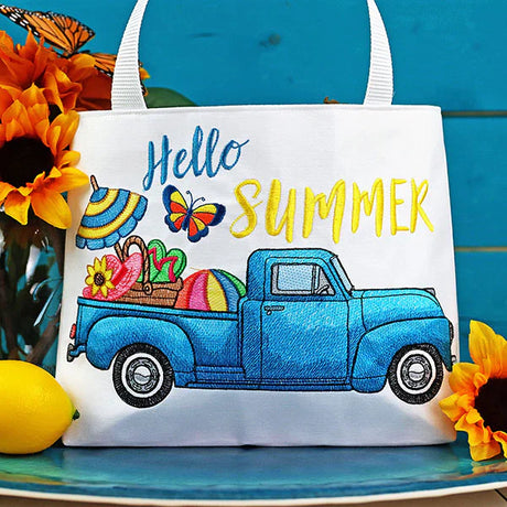 Summer retro truck machine embroidery design on a tote