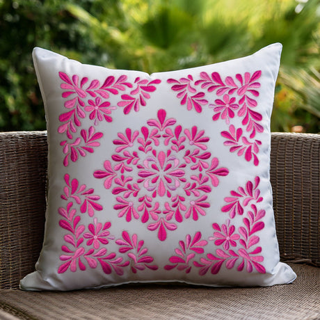 finished pillow using machine embroidered matching corners and a feature.