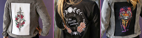 Three jackets with back machine embroidered designs of a rose and sword, moon phases, and tiger, displayed against a purple background.