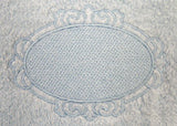 Oval with Floral Border (Embossed)