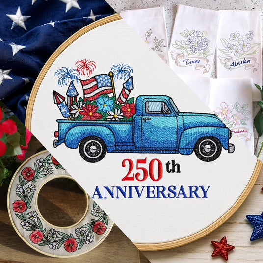 Patriotic machine embroidery designs displayed with a blue vintage truck carrying fireworks and flowers stitched above “250th Anniversary.” Nearby are floral state outline embroidery designs, a red-white-and-blue floral wreath, and patriotic fabric accents.