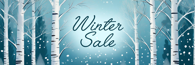 Winter sale text in the center of a snowy forest with birch trees.