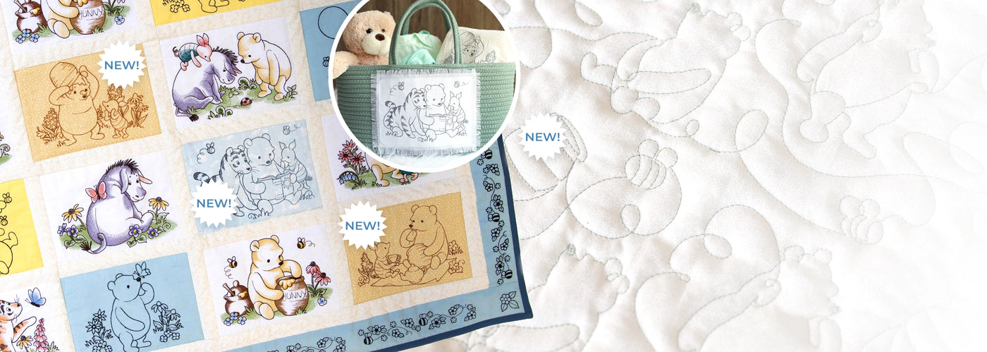 Quilt decorated with Pooh Bear & Friends machine embroidery designs and various "New" labels.