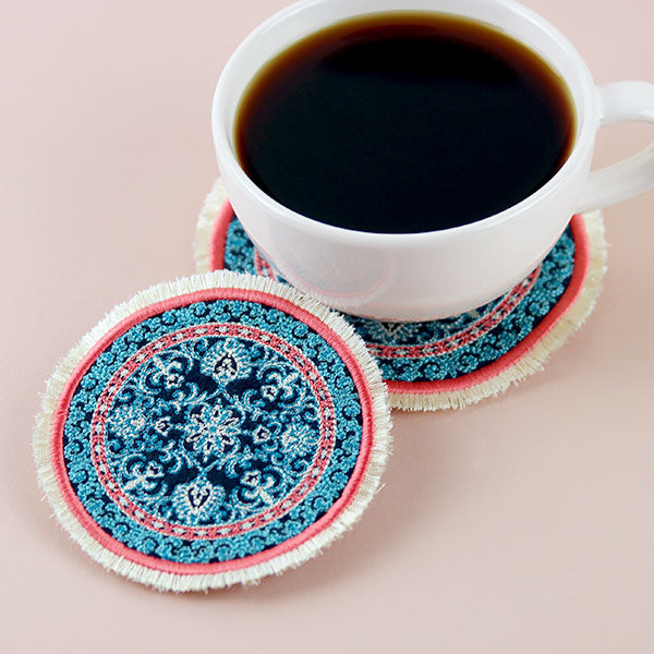 Cozy in Filigree Fringe Mug Rug (In-the-Hoop)