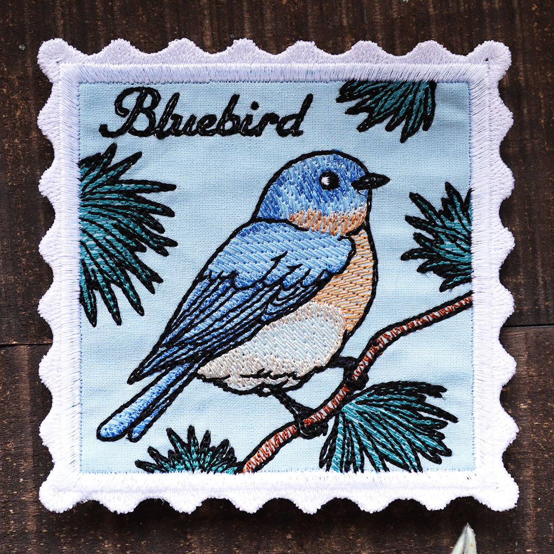 Lace Edge Bird Stamp Coaster - Bluebird (In-the-Hoop)