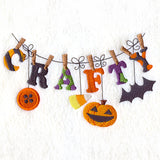 Embroidered letters spelling “CRAFTY” and Halloween motifs arranged on a line; digitally downloadable embroidery design.