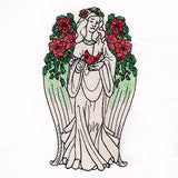 Christmas Poinsettias and Cardinal Angel Statue