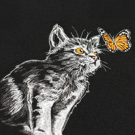 Majestic Gaze Kitten with Butterfly