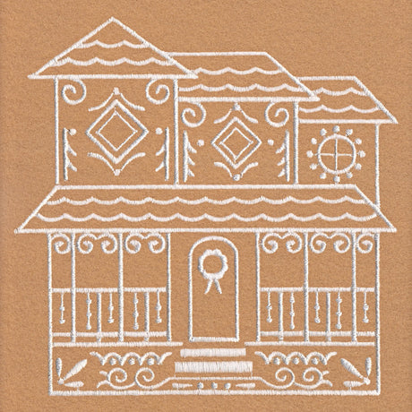 White embroidery of a house with three peaked roofs, decorative diamond and swirl patterns, a front door with a wreath, and a wraparound porch on brown fabric.