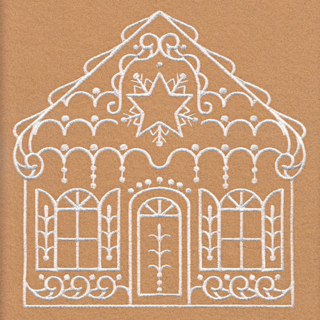 White embroidered outline of a decorative gingerbread-style house with a star on the roof, two arched windows, a centered door, and ornate swirls on a tan fabric background.