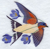 Flying Barn Swallow with Crocuses