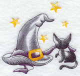 A Halloween Kitten with Witch's Hat and Stars