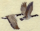 Canada Goose Pair in Flight