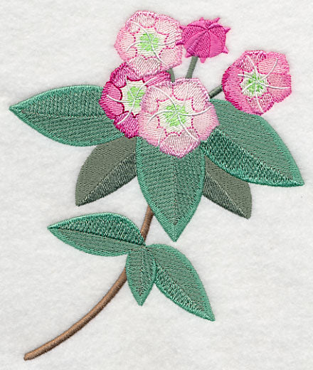 Embroidered pink mountain laurel flowers with green leaves form a long stem on white fabric; digital embroidery design.