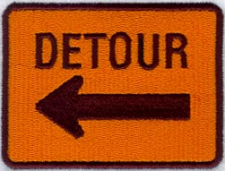 Detour Left Sign