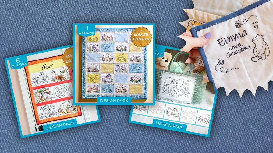 Three machine embroidery design packs displayed on a blue textured fabric background, with a hand holding a finished quilted banner that reads 'Emma Love Grandma' with a bear illustration.