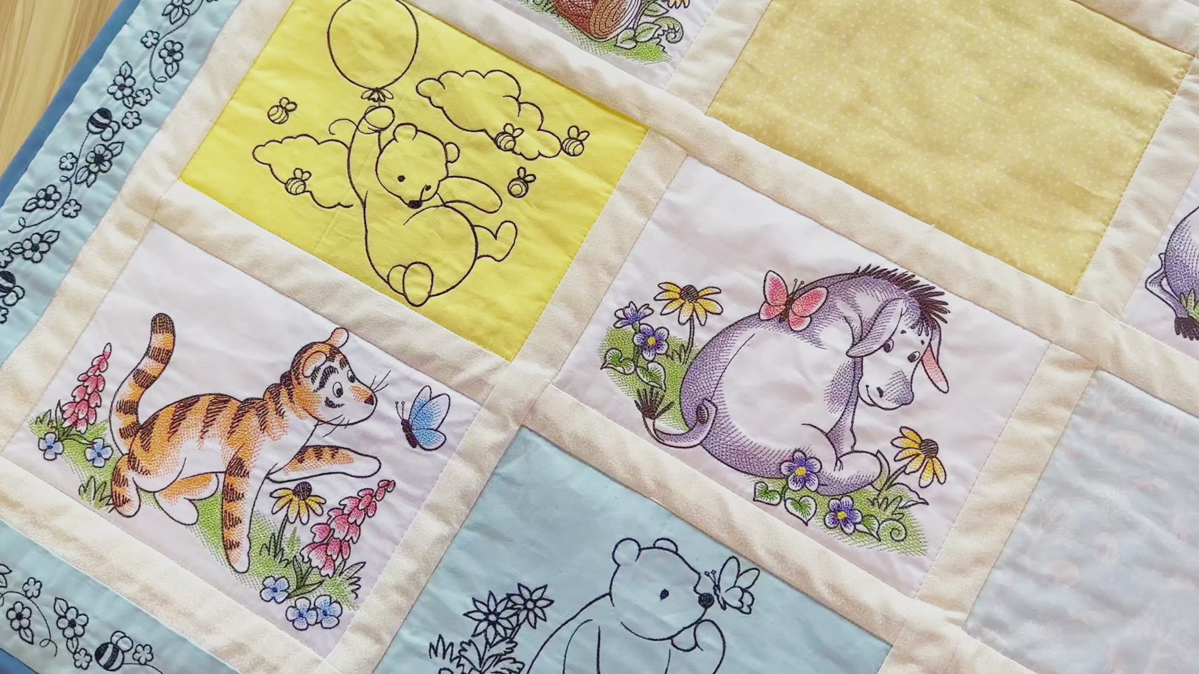 Video of a machine embroidery quilt featuring Pooh Bear & Friends themed machine embroidery designs.